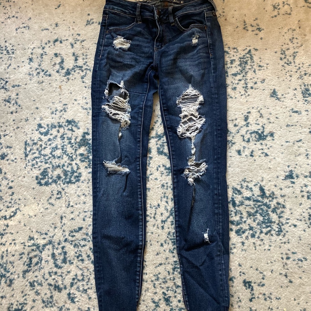 American eagle ripped blue jeans
